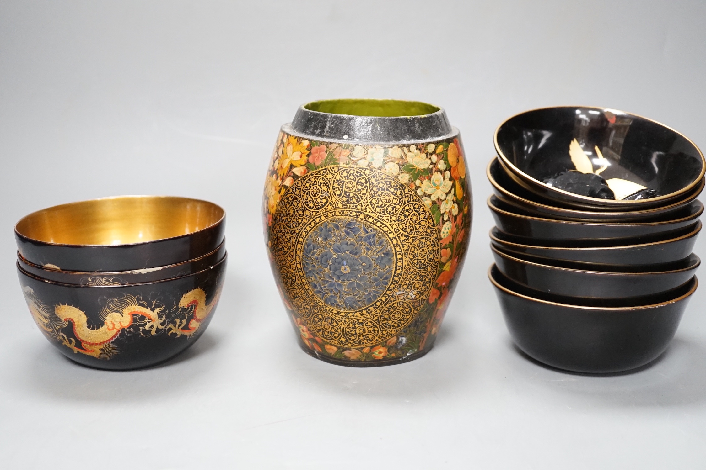 Mixed decorative Oriental and Indian lacquer wares, the barrel shaped jar 15.5cm